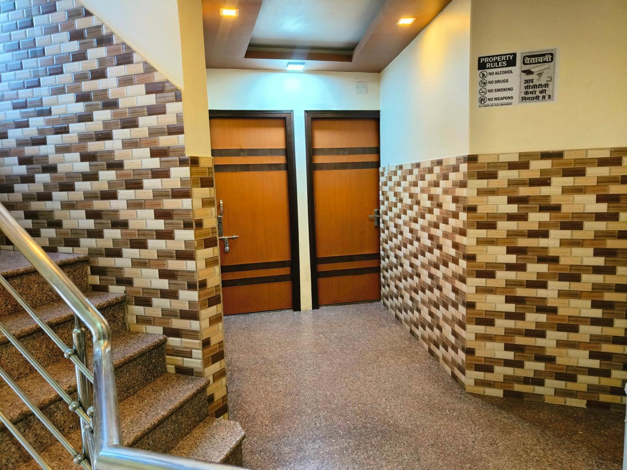 H M International Varanasi